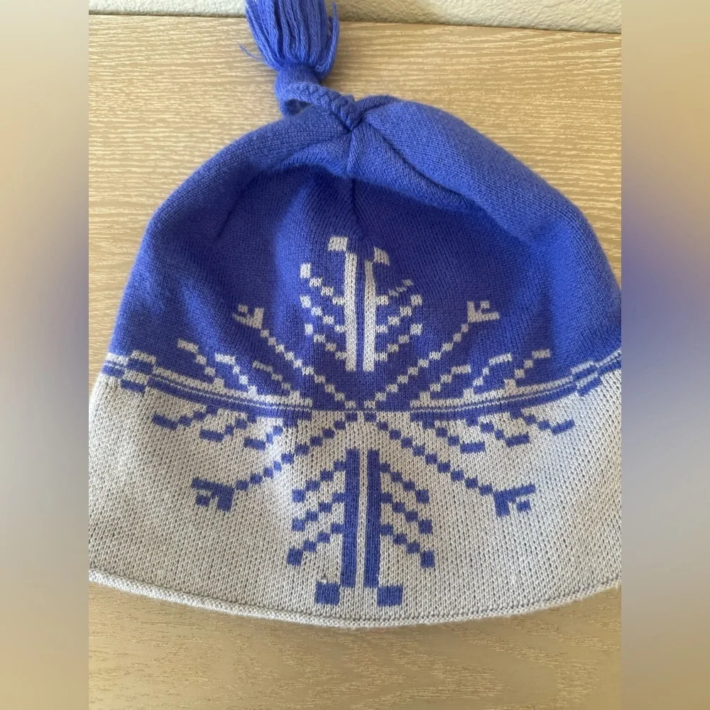 Patagonia Beanie Hat, snowflake design with small tassel top.